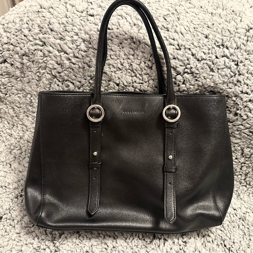Black leather Cocinelle purse with detachable shoulder strap.